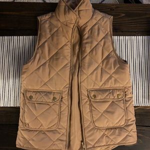 Francesca’s gold vest